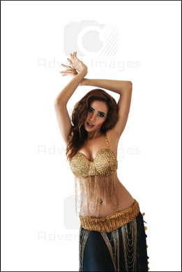 Belly Dancer Posing In Gold Black Costume White Background