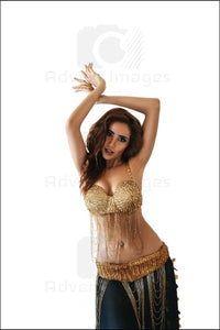 Belly Dancer Posing In Gold Black Costume White Background