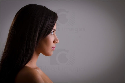 Brunette Model Looking To Sunlight For Hope With Grey Wallpaper Background Art Images