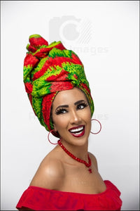 Happy Laughing African Fair Woman Wearing A Culture Head Wrap Beauty Shoot With Make Up Red Lipstick